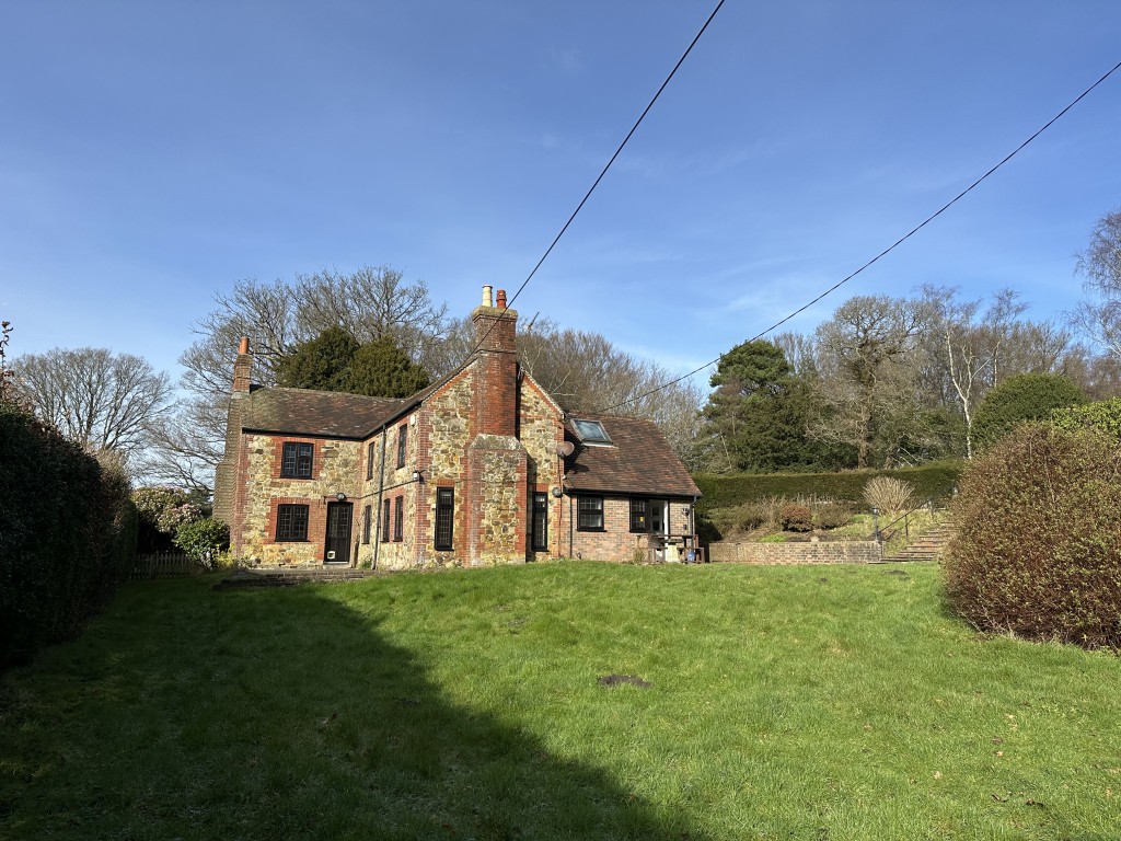 Lot: 135 - DETACHED COTTAGE FOR REFURBISHMENT ON 1.23 ACRES OF GROUNDS - External of Property with surrounding gardens